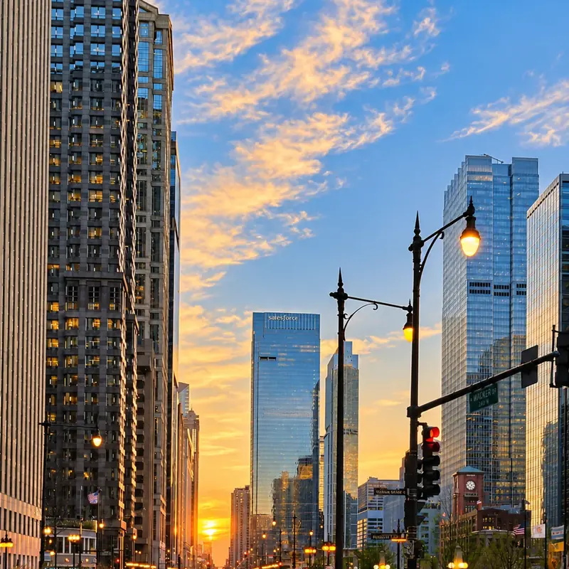 Chicago street canyon and Salesforce Tower at sunset